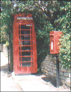 Post box and phone box in the village